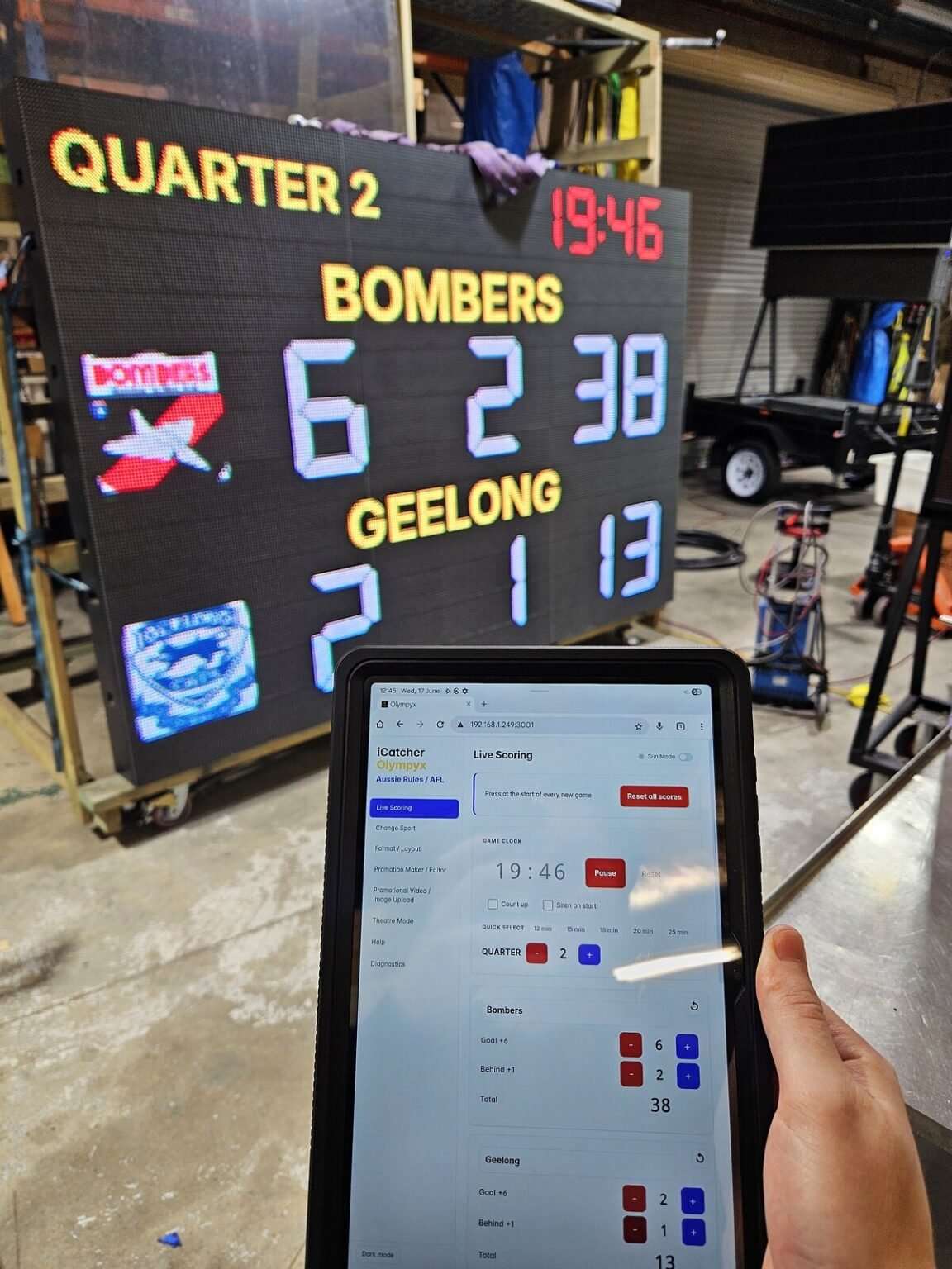 Olympyx on a tablet scoring a full-colour LED scoreboard in the iCatcher workshop
